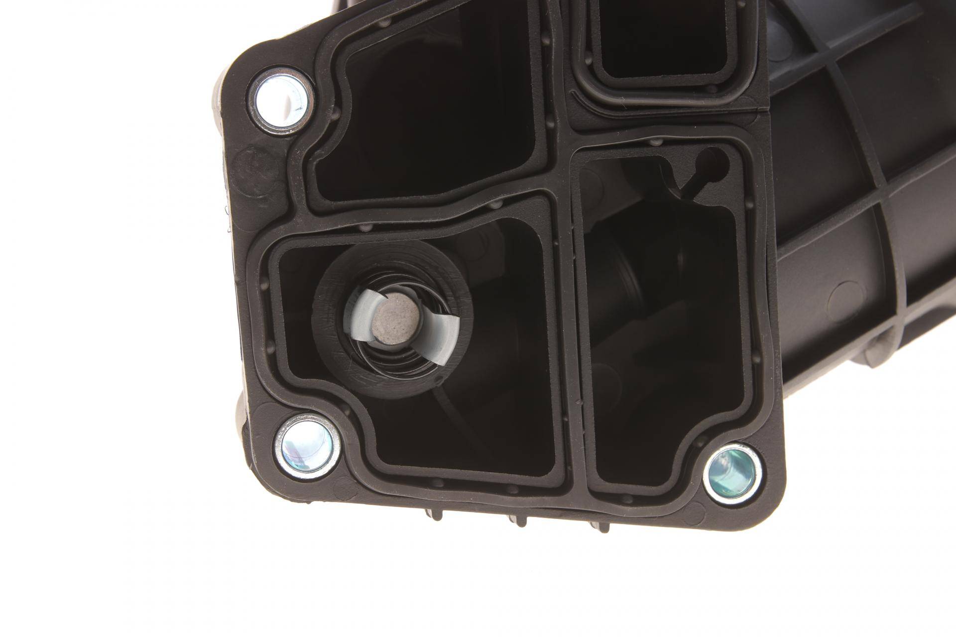 Корпус фільтра масляного (з радіатором) VW Polo/Skoda Fabia 1.2 TDi 09-