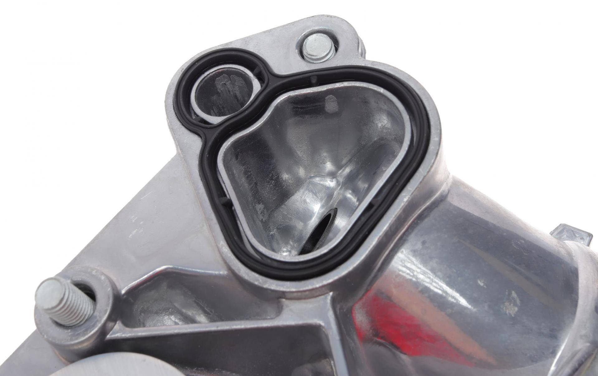 Корпус фільтра масляного (з радіатором) Opel Astra H/J/Vectra C/Zafira 1.6/1.8 06-15