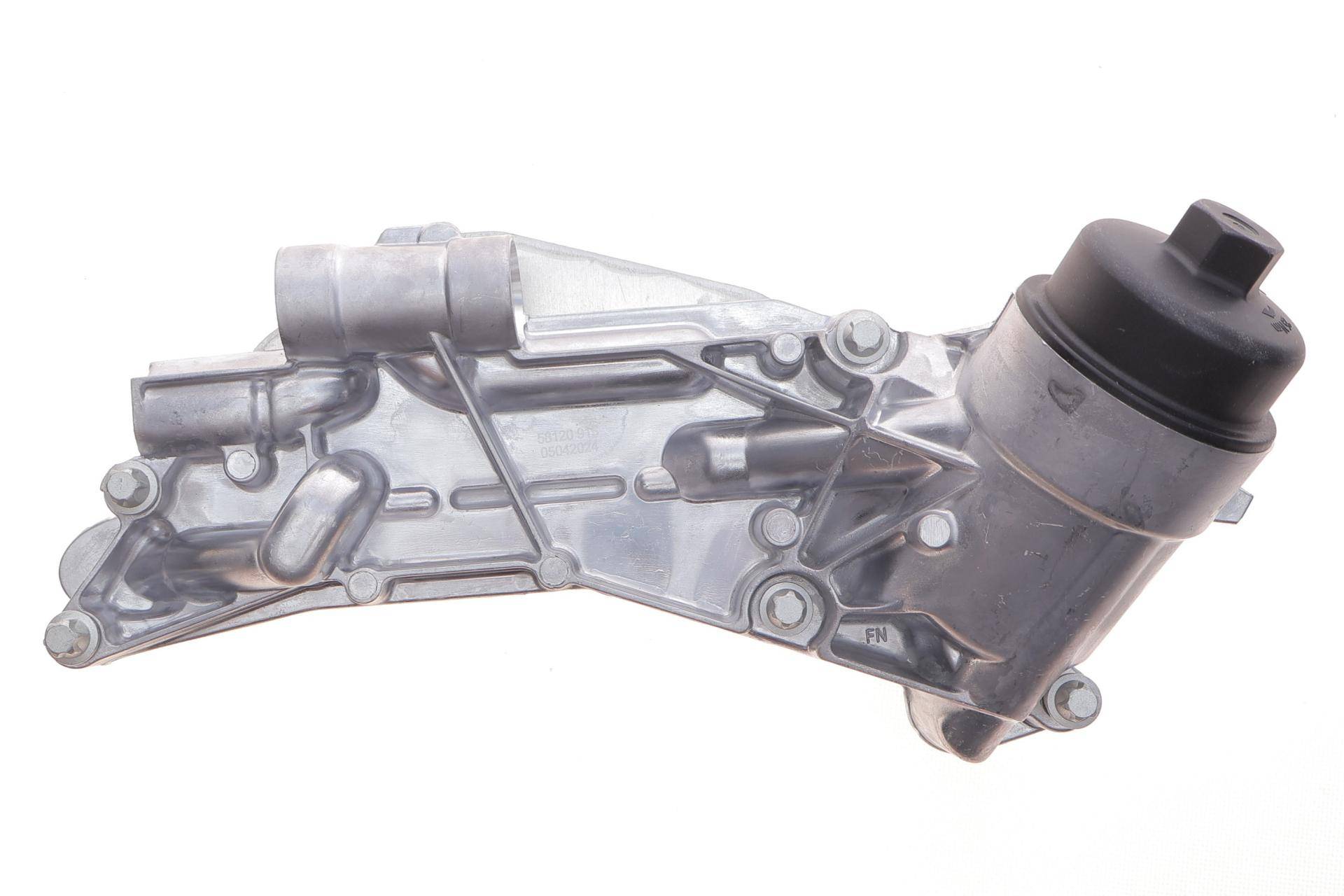 Корпус фільтра масляного (з радіатором) Opel Astra H/J/Vectra C/Zafira 1.6/1.8 06-15